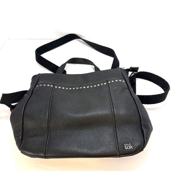 The Sak Black Leather Backpack Crossbody with Mint Patterned Interior